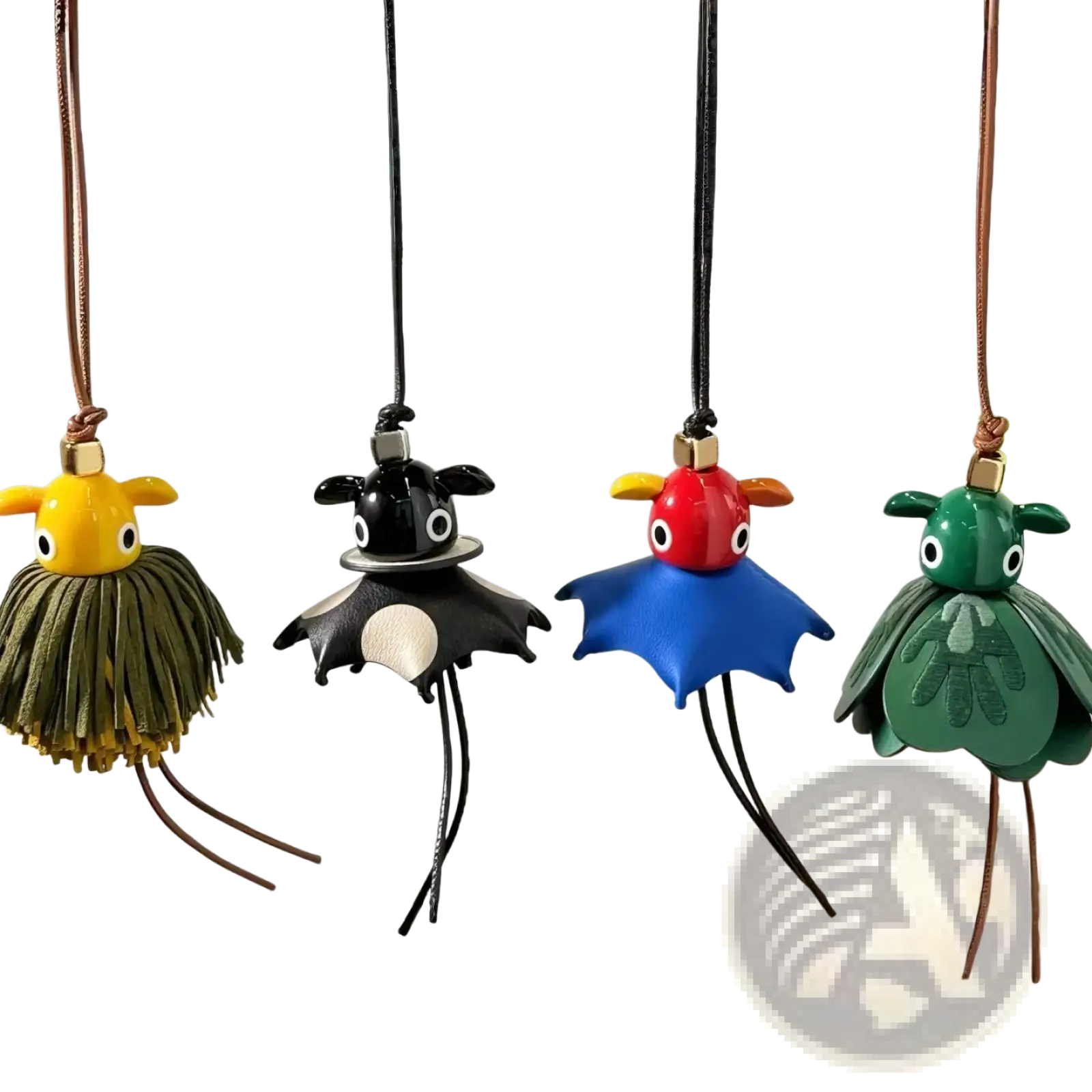 Leather animal bag charm cute designer keychain featuring four colorful handcrafted leather whimsical creature keychains