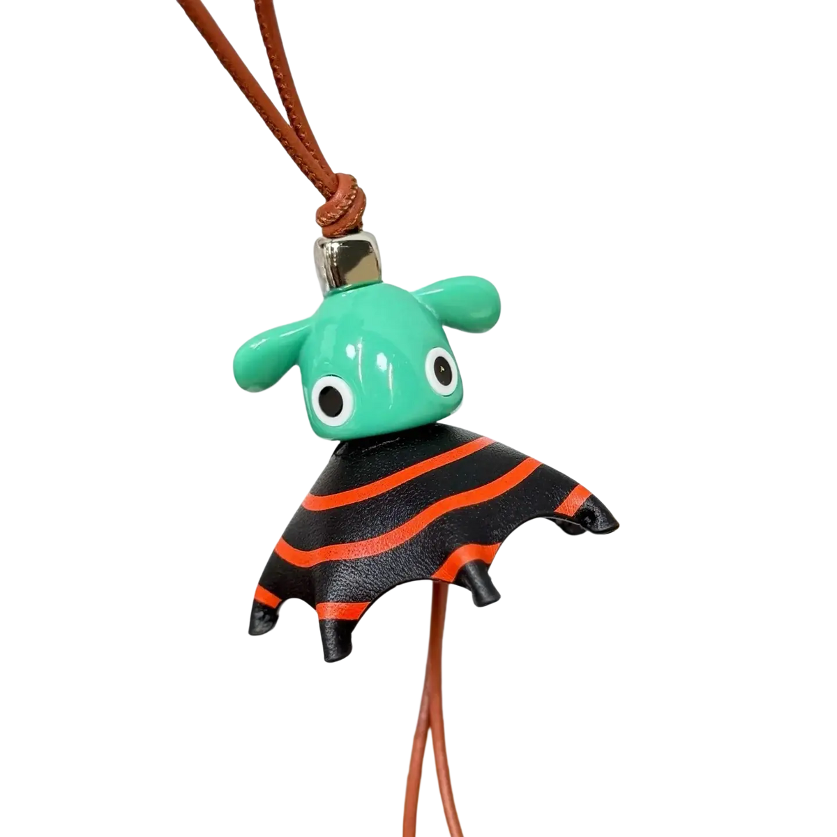 Leather animal bag charm cute designer keychain featuring a turquoise and black striped bat with white eyes on a leather cord