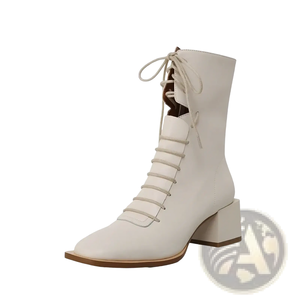 Cream-colored leather ankle boots with lace-up front square toe and block heel ideal for winter wear