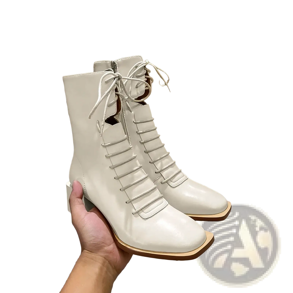 Cream-colored patent leather leather ankle boots with square block heel and lace-up front for winter use