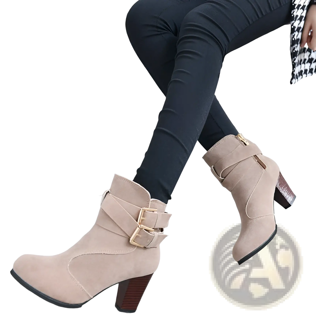 Beige suede leather ankle boots with gold-tone buckle straps and a block heel for stylish wear