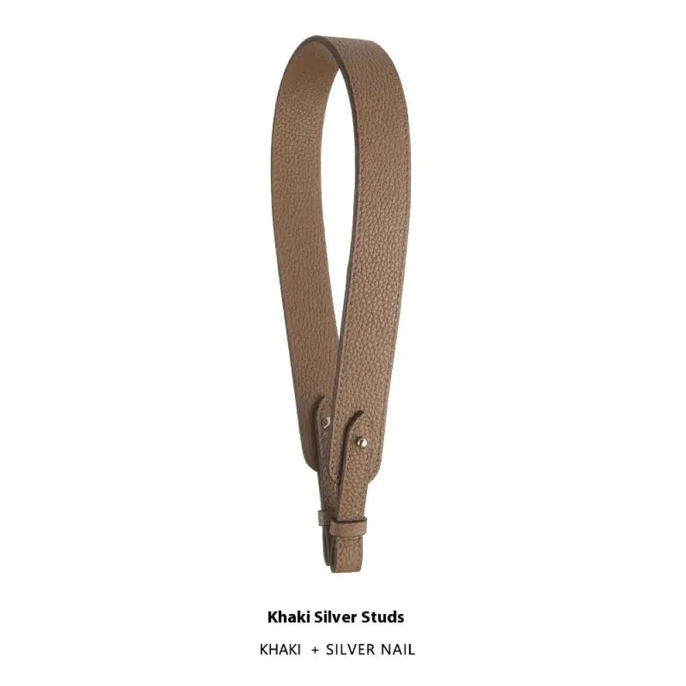 Adjustable textured leather handbag strap in khaki with silver nail hardware and gold clasp for versatile use