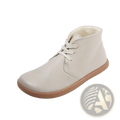 Cream-colored leather barefoot chukka boot with wool lining tan rubber sole and matching laces zero drop wide toe
