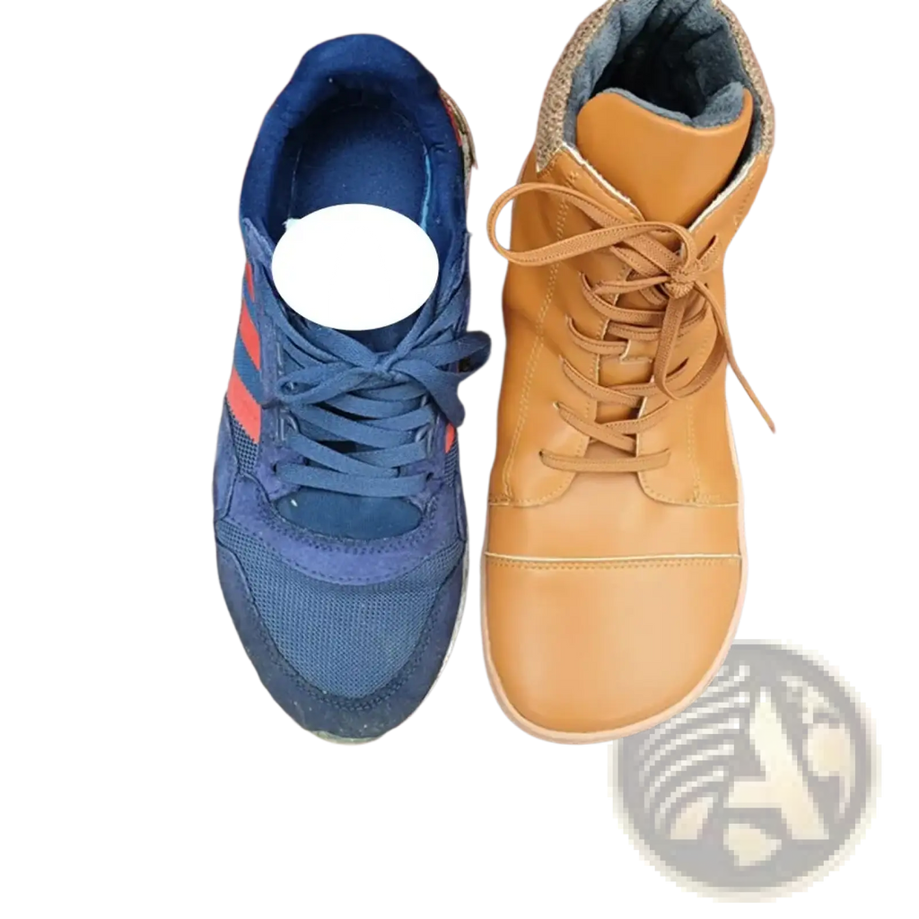 A navy blue and orange adidas sneaker with mesh panels next to a tan leather barefoot boot wool lined wide toe zero drop