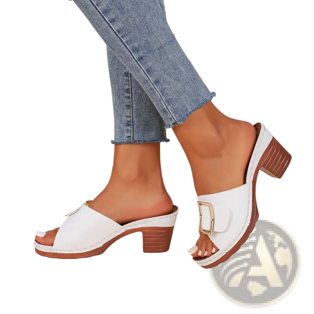 White leather block heel mule sandals with brown wooden heel and gold-tone buckle for stylish wear