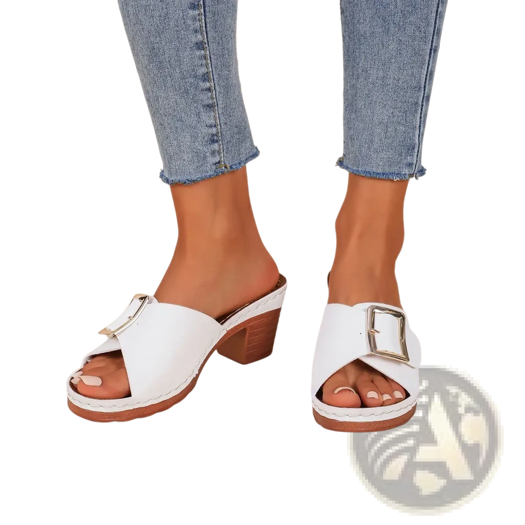 White leather block heel mule sandals with silver buckle and wooden heel for stylish casual wear