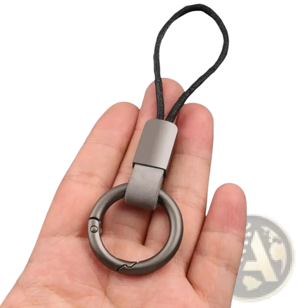Gray metal leather braided carabiner keychain with a leather strap and black braided cord for secure key holding
