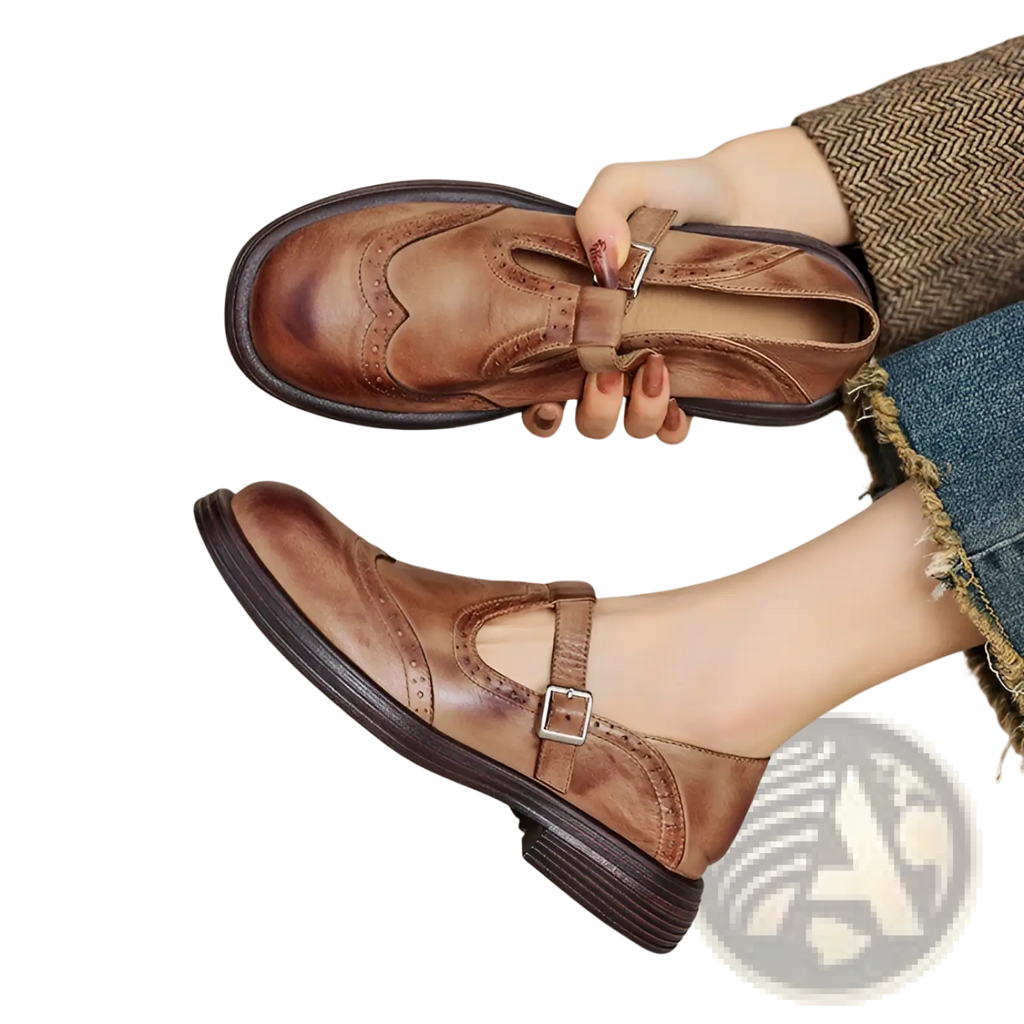 Leather brogue mary jane shoes for women in brown leather with classic brogue design and silver buckle closure