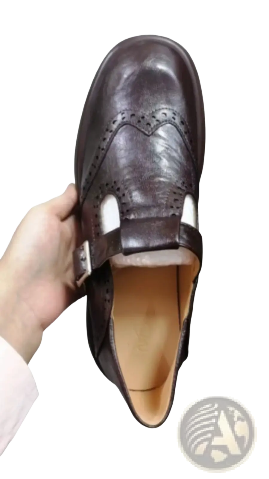 Brown leather brogue mary jane shoe for women with buckle strap and perforated detailing in brown color