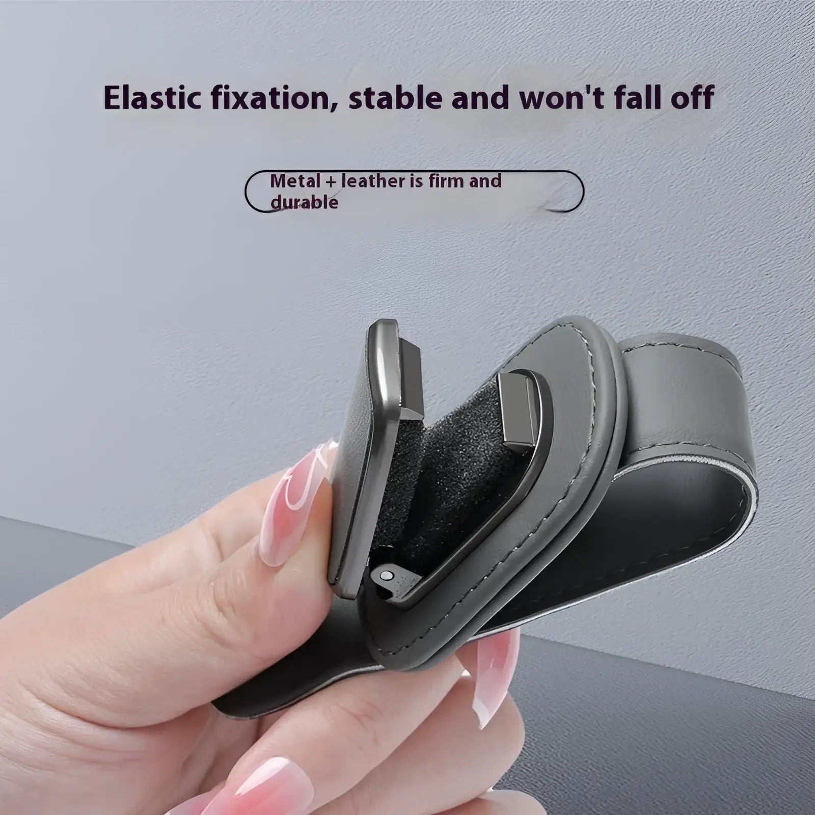 Black leather and metal leather car glasses clip holder with elastic fixation for secure phone storage in car