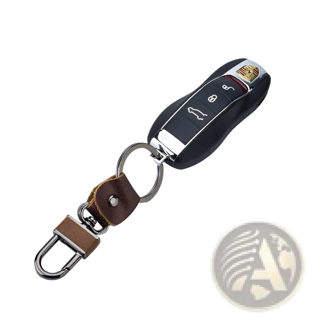 Black leather car key chain with silver metal ring and carabiner featuring a Porsche remote fob by Bullcaptain