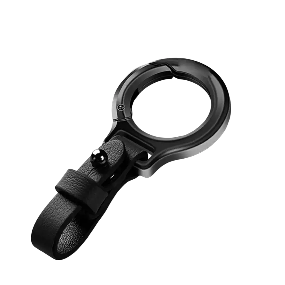 Black leather car keychain with a durable metal ring and polished spherical accent for stylish key organization