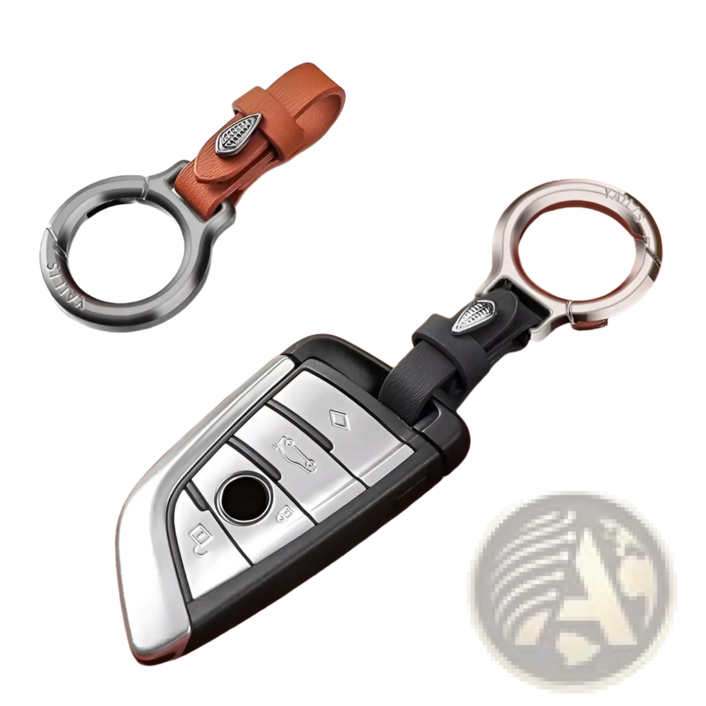 Leather car keychain with leaf charm featuring a silver and black car key fob cover with leather strap and metal ring