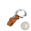 Leather car keychain in brown with a silver metal loop and a small engraved emblem on the leather ring
