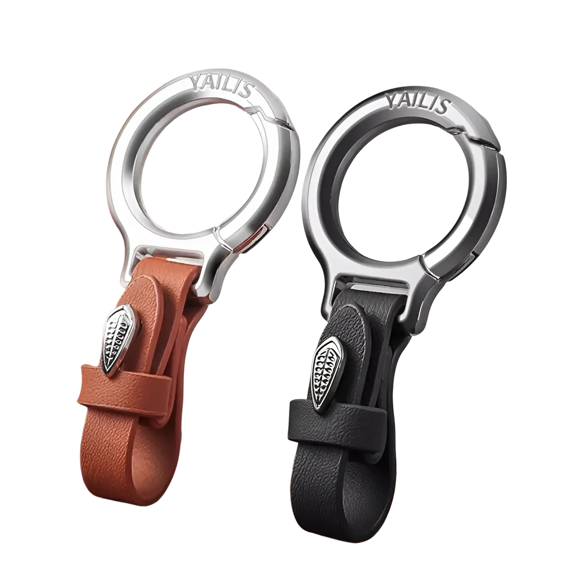 Two yailis leather car keychains with tan and black straps silver metal clasps and leaf-shaped charms