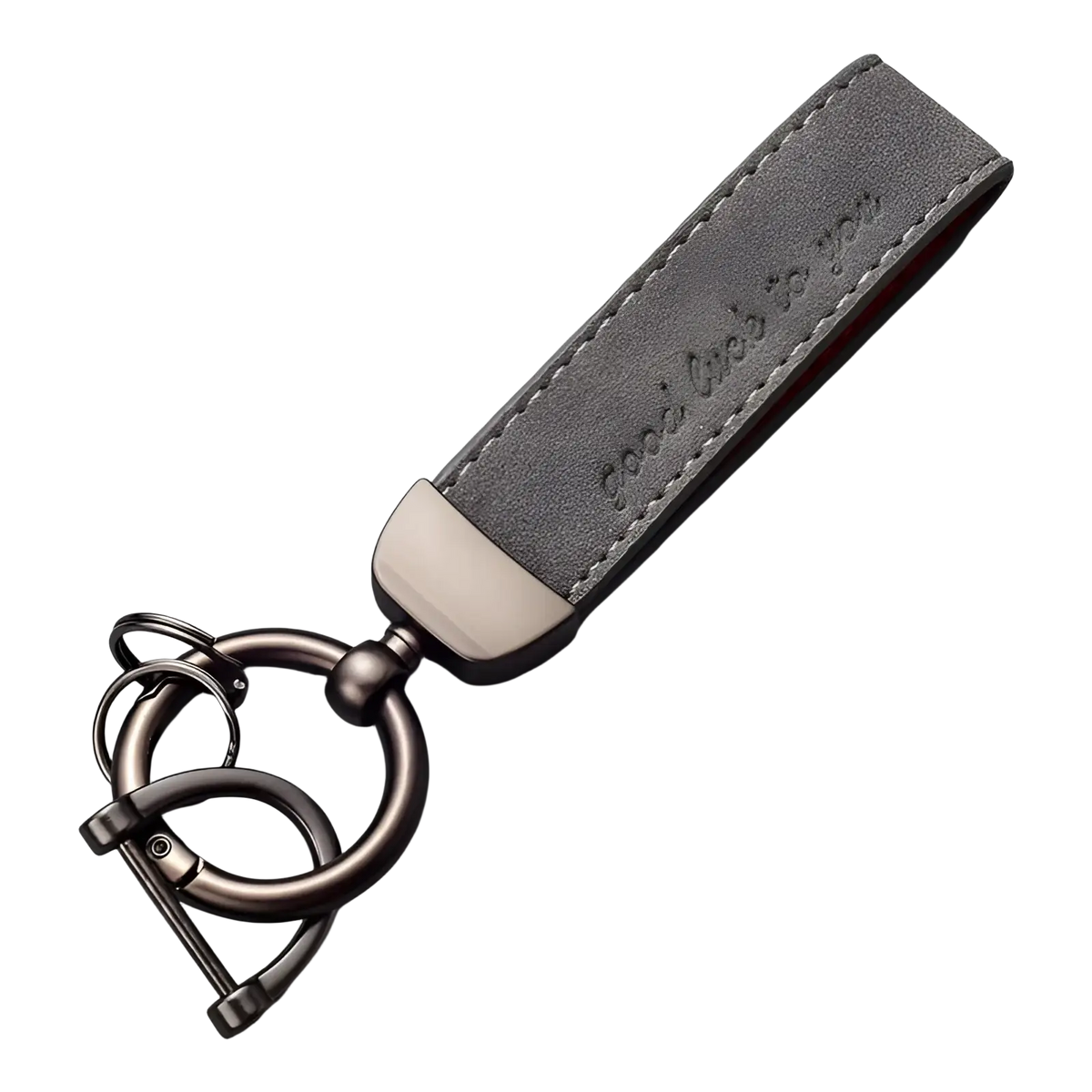 Gray leather car keychain with brushed metal ring and clasp featuring embossed text along the strap