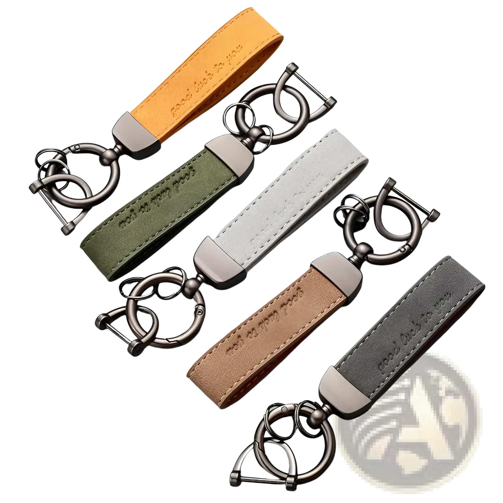 Set of four leather car keychains in orange, olive green, beige, and gray with brushed metal hardware