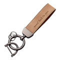 Tan leather car keychain with brushed metal clasp and engraved phrase luxury genuine leather key ring