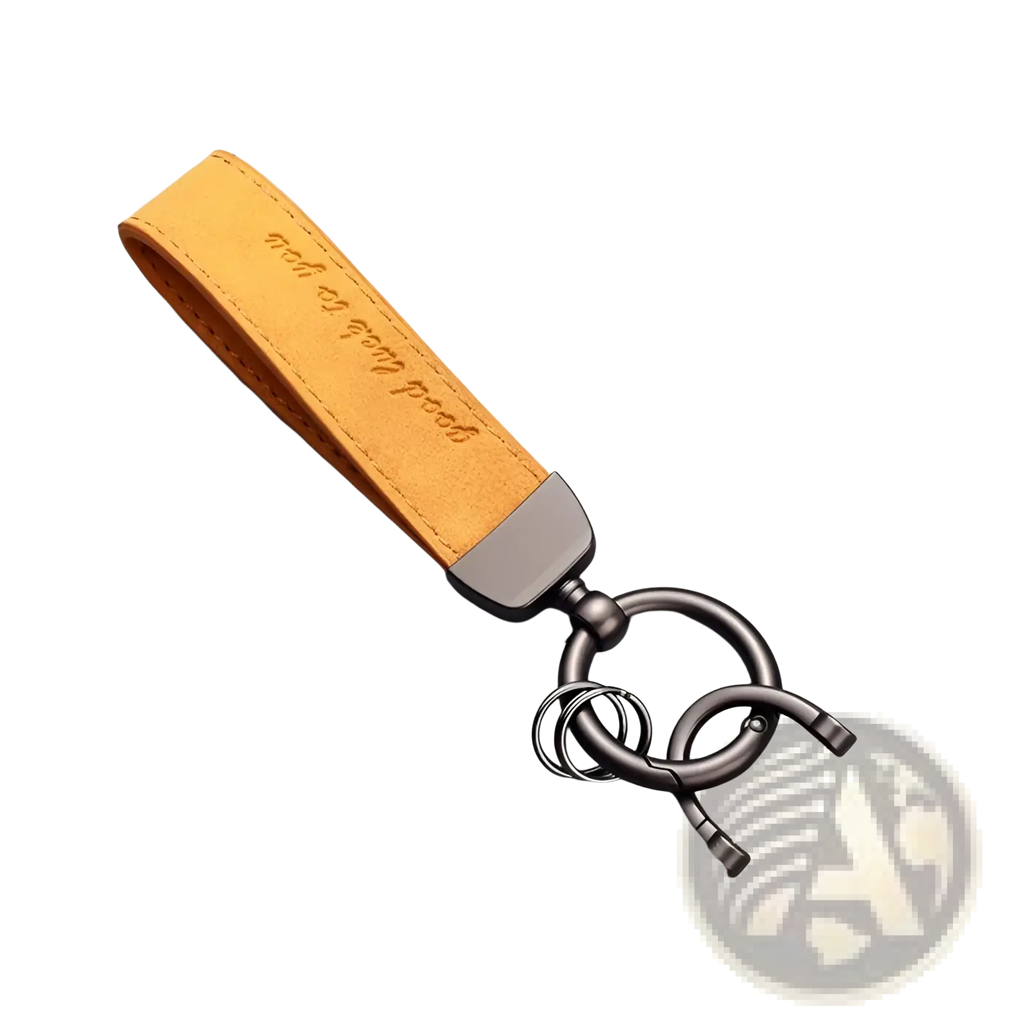 A tan leather car keychain with zinc alloy clasp and ring engraved with good luck to you luxury genuine leather key ring