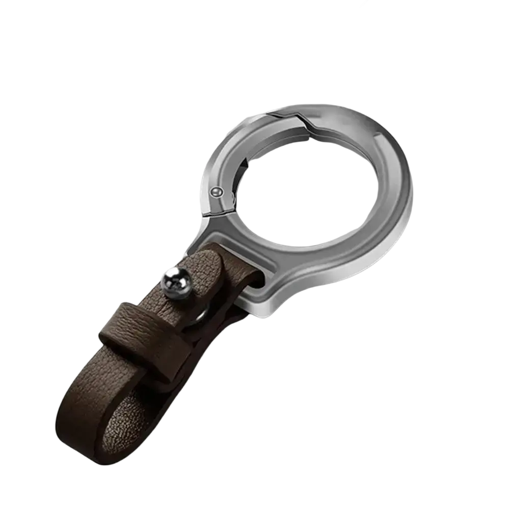 Leather car keychain with silver-toned metal clip, ring, brown leather strap, and small metallic ball accent