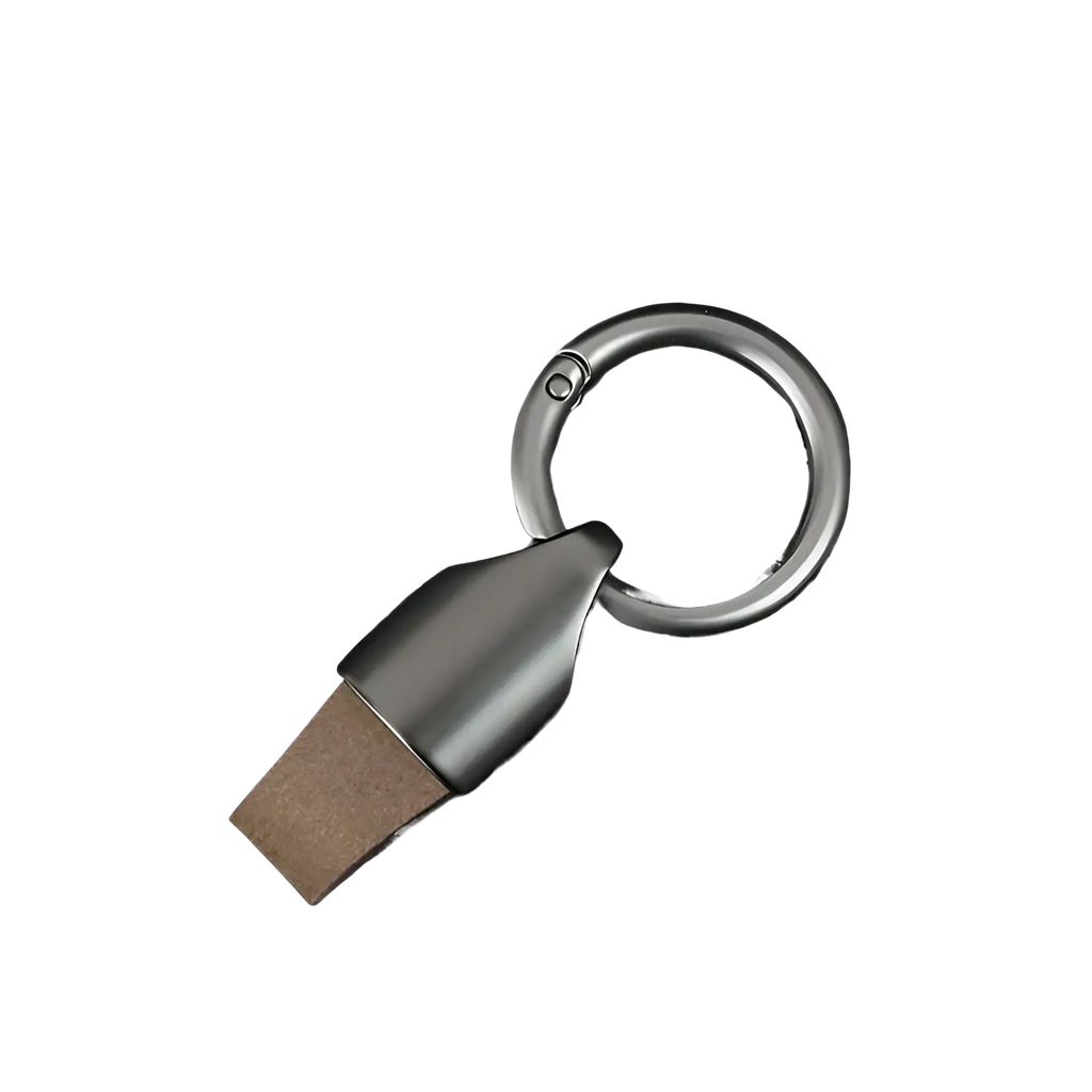 Silver usb flash drive with matte metallic finish and brown leatherette cap attached to leather car keychain metal holder