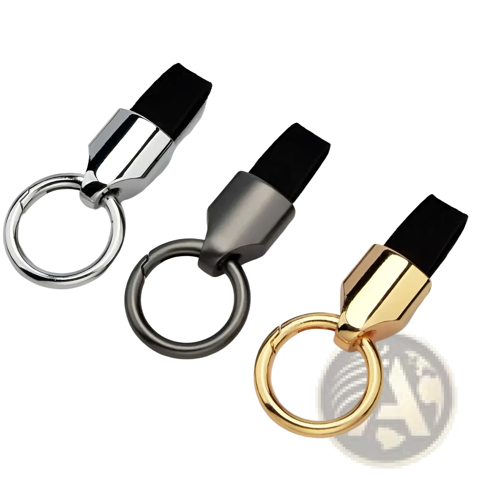 Three sleek leather car keychains with black fabric straps and metallic finishes in silver gunmetal and gold colors