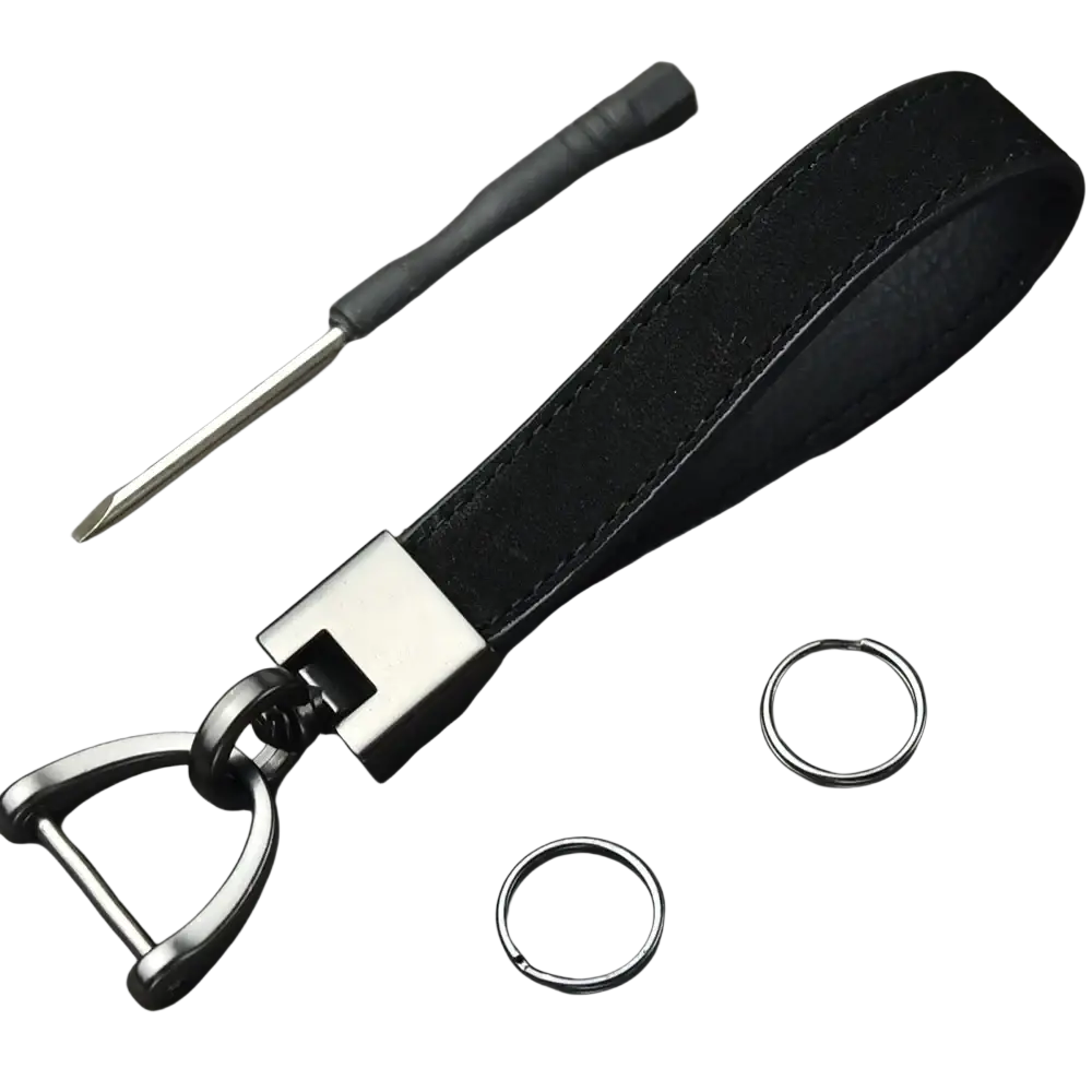 Black leather minimalist car keychain with silver-toned metal buckle and d-ring for secure key organization