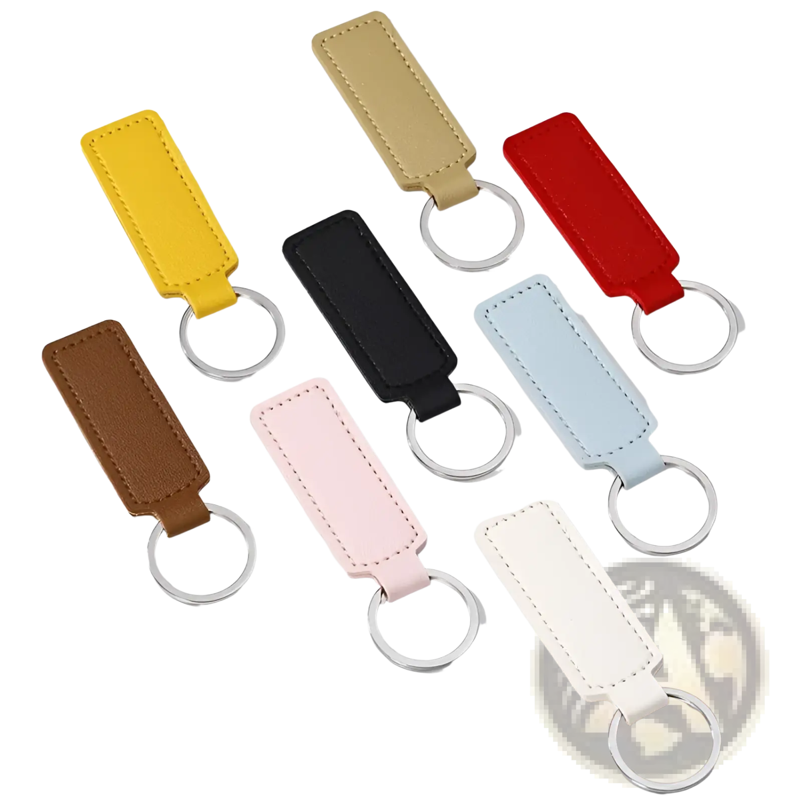 A collection of rectangular leather car keychain minimalist strip key rings in assorted colors including yellow and black