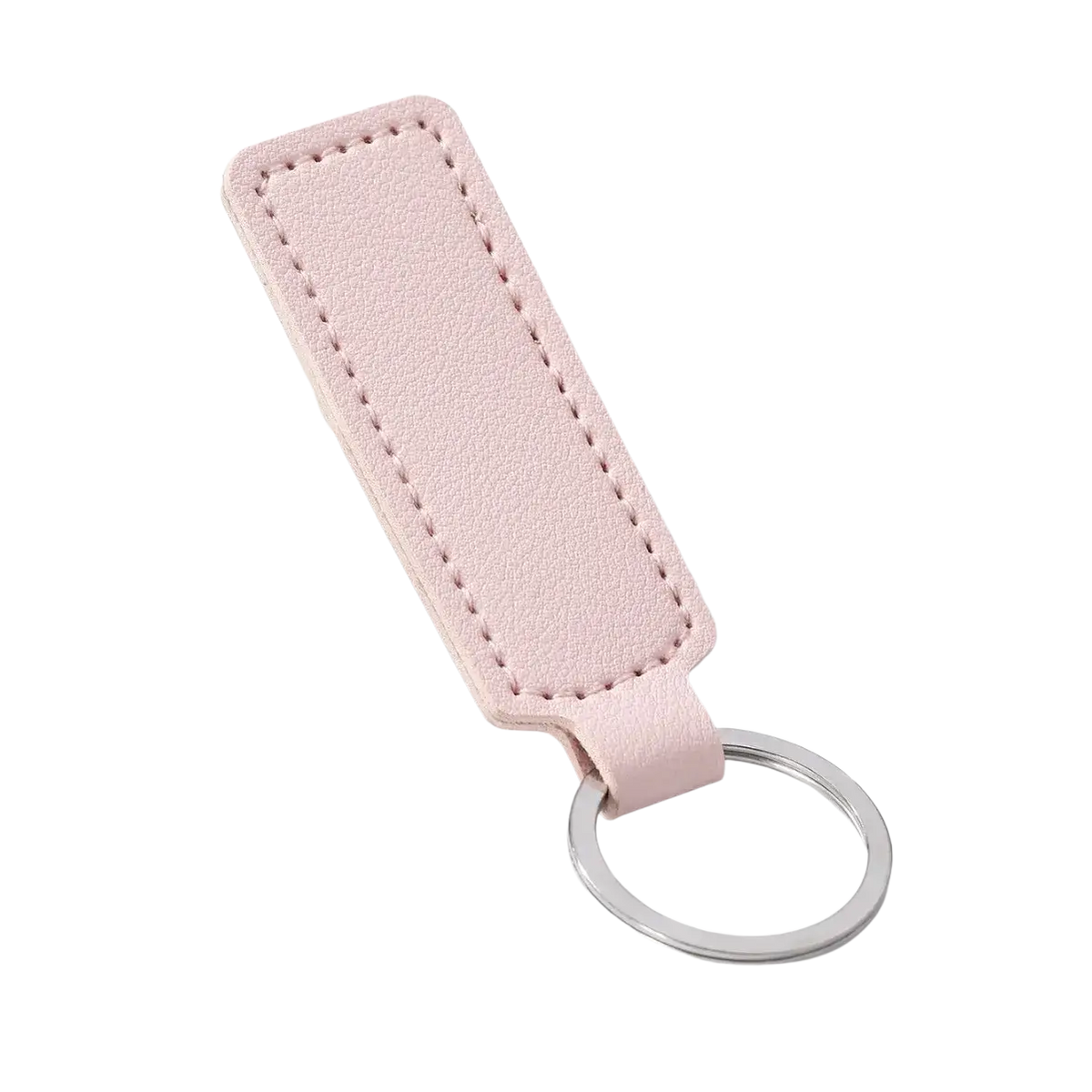 A delicate pink leather minimalist strip key ring with sleek silver ring and precise stitching for car keys