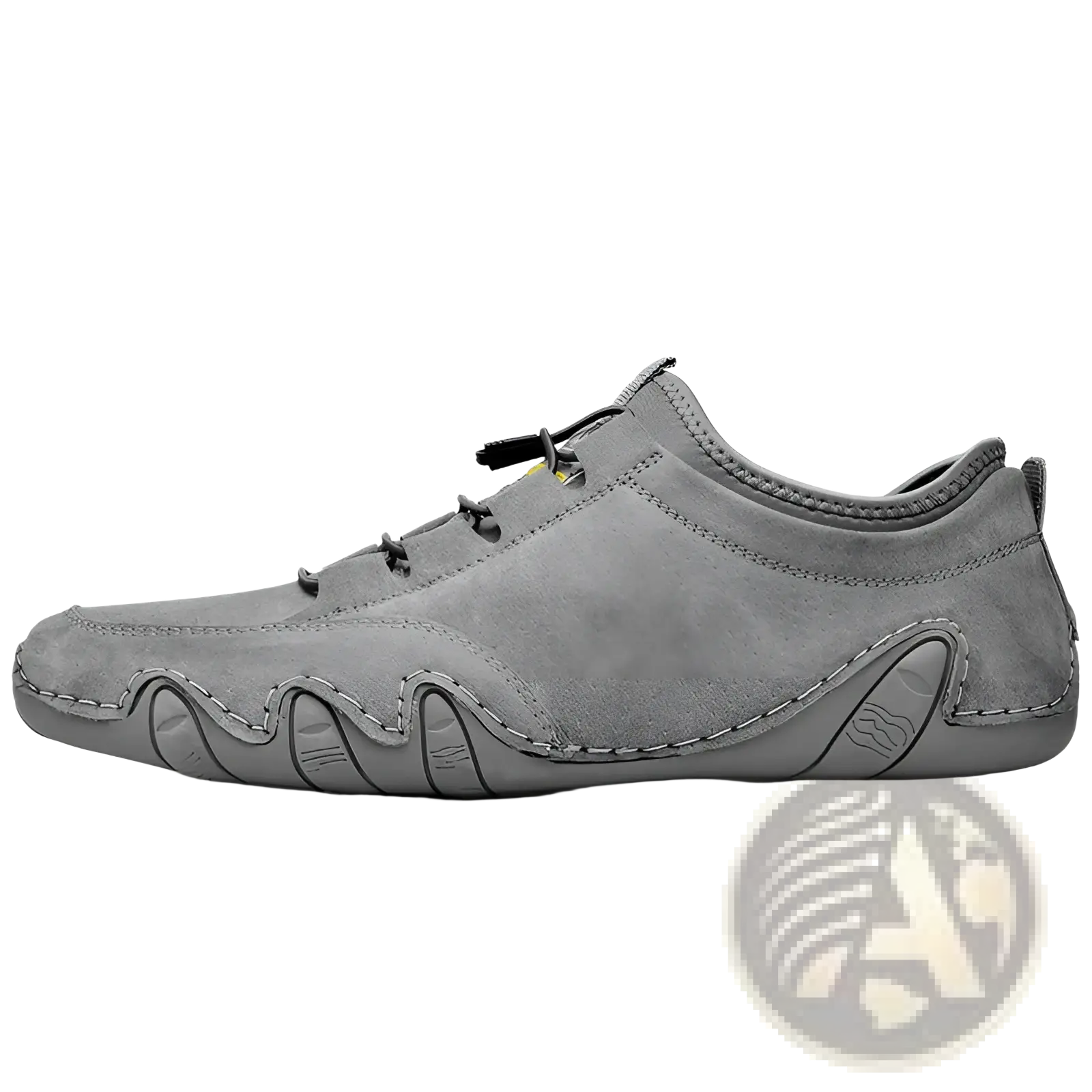 Gray suede leather casual slip on shoe with black laces and a textured wavy rubber sole for everyday wear