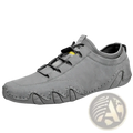 Gray leather casual shoes featuring suede slip-on design with black laces and distinctive wavy sole sneakers