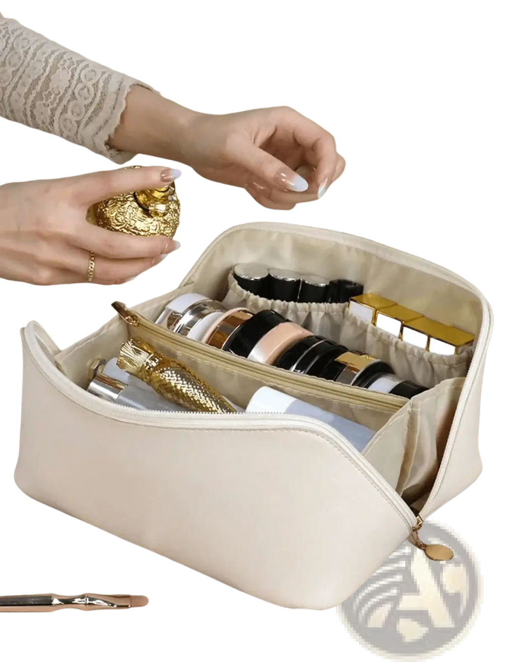 Cream-colored faux leather makeup organizer with gold zipper and interior compartments for cosmetics storage