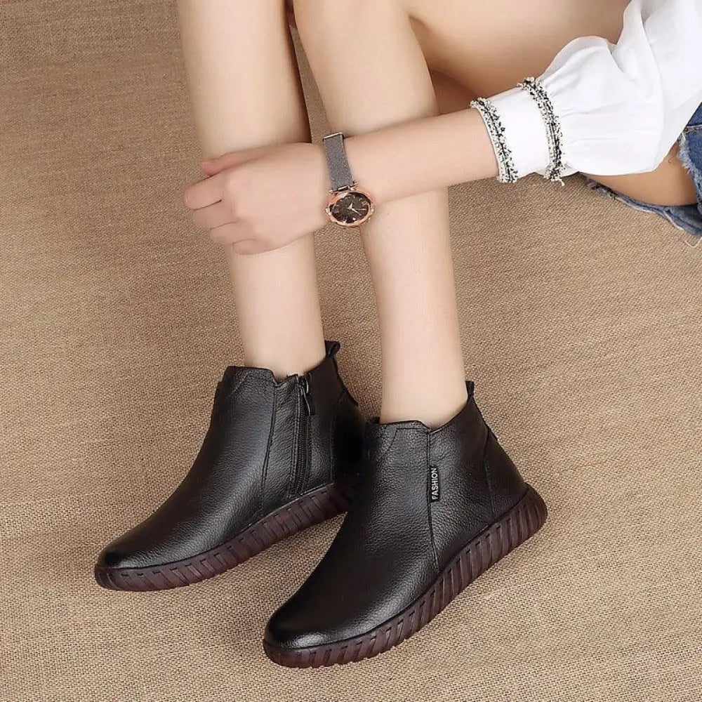 Black leather women’s ankle boots with warm cotton lining non-slip textured sole and zipper closure