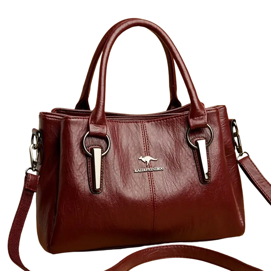 Burgundy leather crossbody handbag with silver-tone kangaroo logo dual top handles and pocket interior for organization