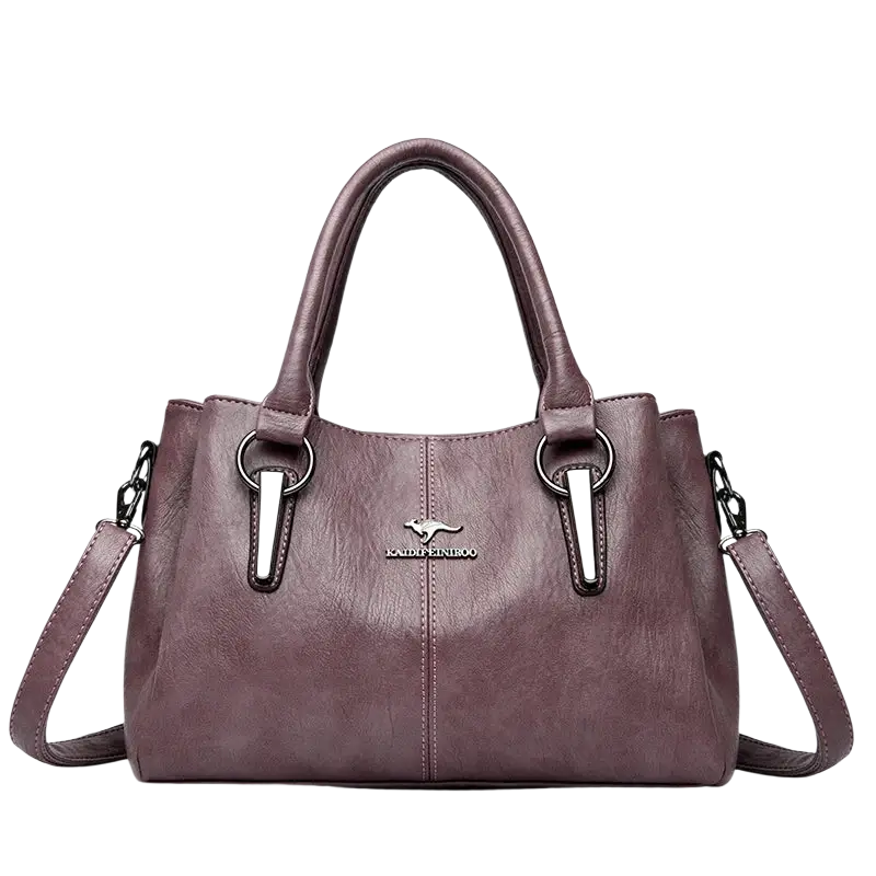 Purple faux leather crossbody handbag with silver-tone accents and kangaroo logo featuring a pocket interior