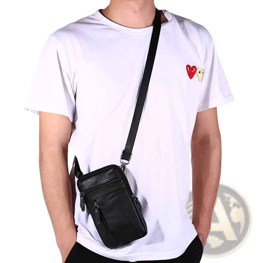 Black leather crossbody phone pouch belt bag with a textured surface and multiple zippered compartments