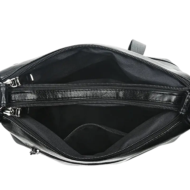 Black leather crossbody shoulder handbag shopping bag with dual zippered compartments and pocket interior details