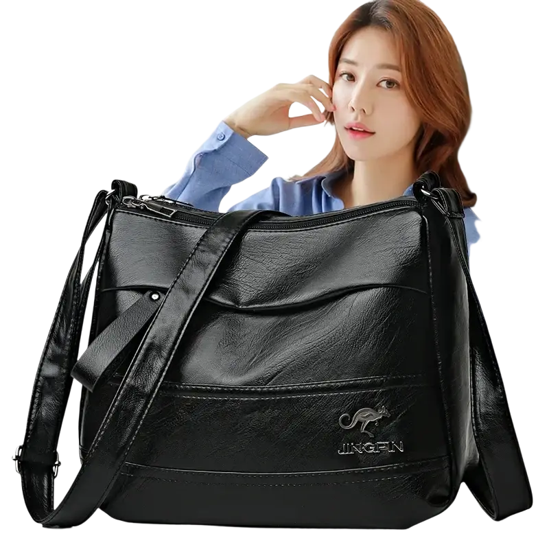 Black leather crossbody shoulder handbag shopping bag with kangaroo logo and jing-fn branding featuring pocket interior
