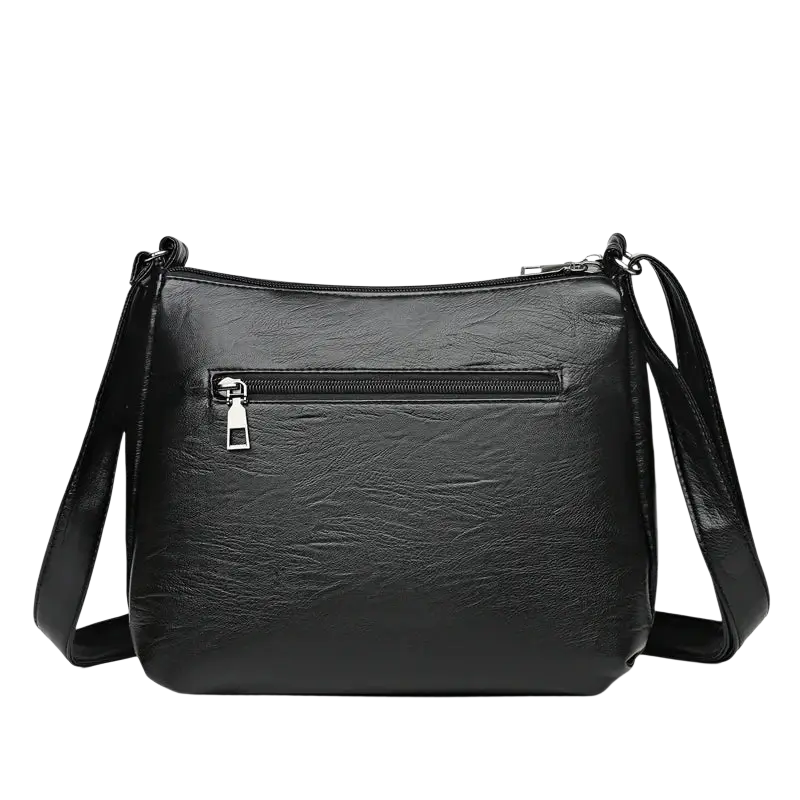 Black faux leather crossbody shoulder handbag shopping bag with textured surface and silver-toned zipper pocket interior