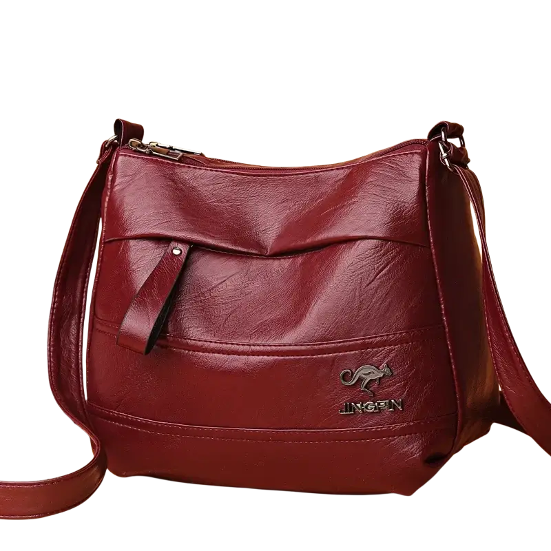 Burgundy leather crossbody shoulder handbag shopping bag with kangaroo logo jingfin branding and pocket interior details