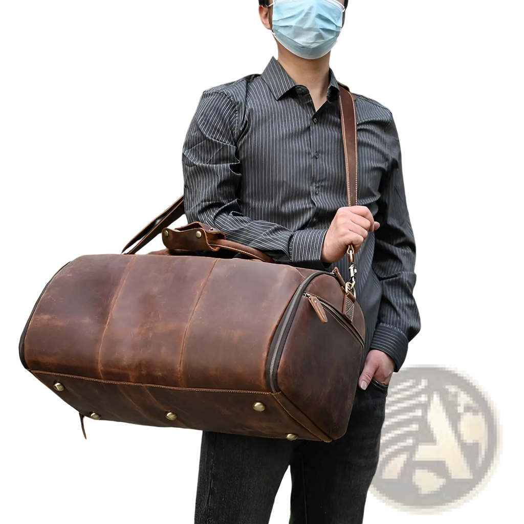 Brown leather duffle bag vintage large folding travel bag with brass hardware and sturdy shoulder strap