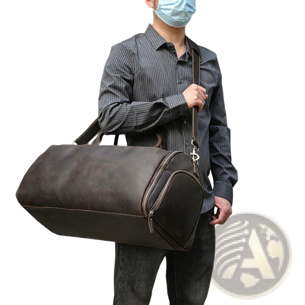 Dark brown leather vintage large duffle bag with sturdy strap and zipper closures for travel
