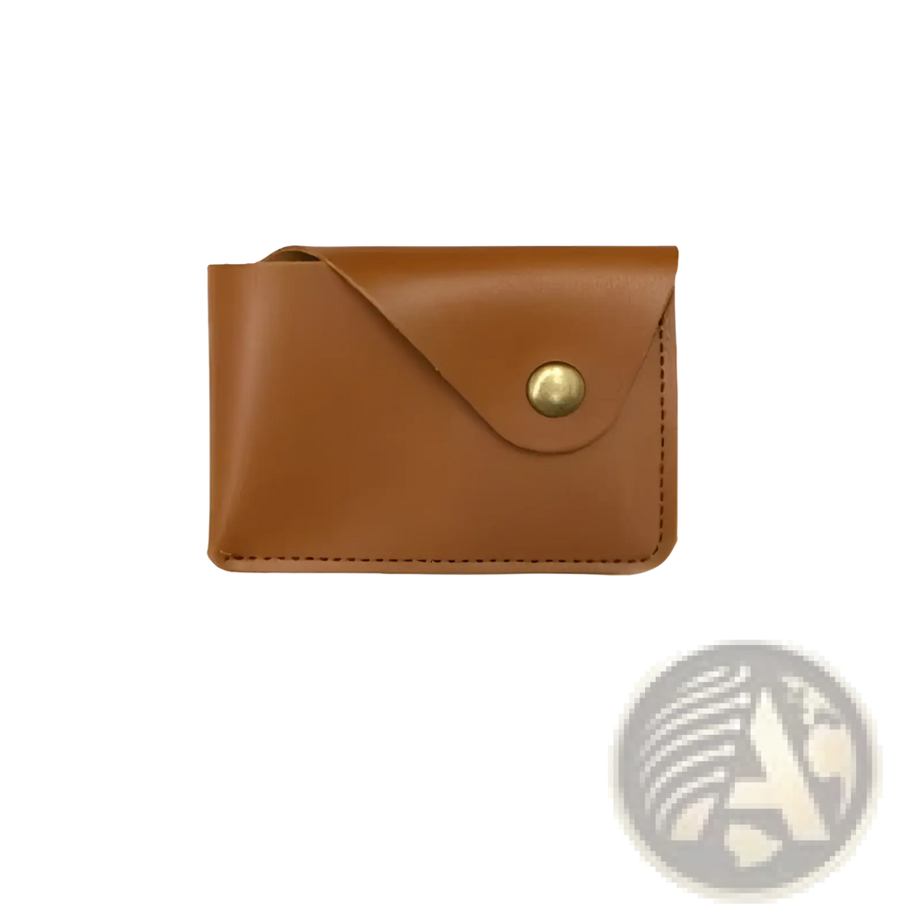 A compact tan leather card holder with gold snap button closure and stitching from the leather elephant bag charm set