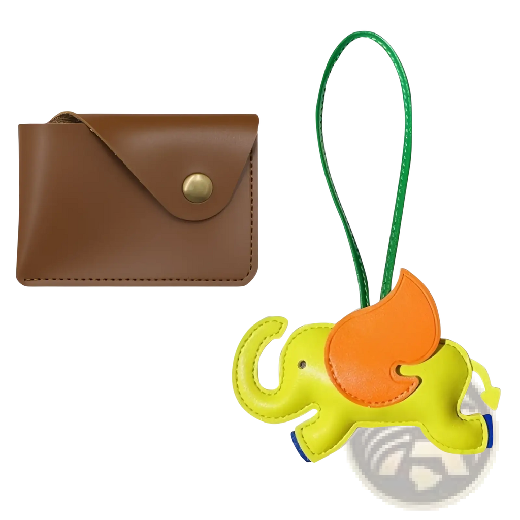 Bright yellow and orange leather elephant bag charm with a green strap from the leather elephant bag charm and slim card holder set