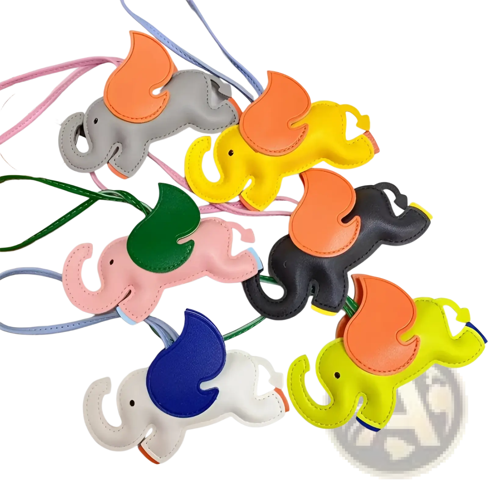 Leather elephant bag charm and slim card holder set featuring colorful stitched elephant-shaped keychains with vibrant accents