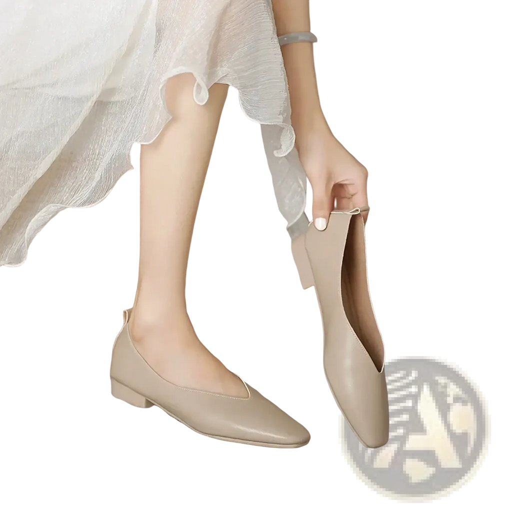 Beige leather flat shoes for women with pointed toe slip on design and low casual heel