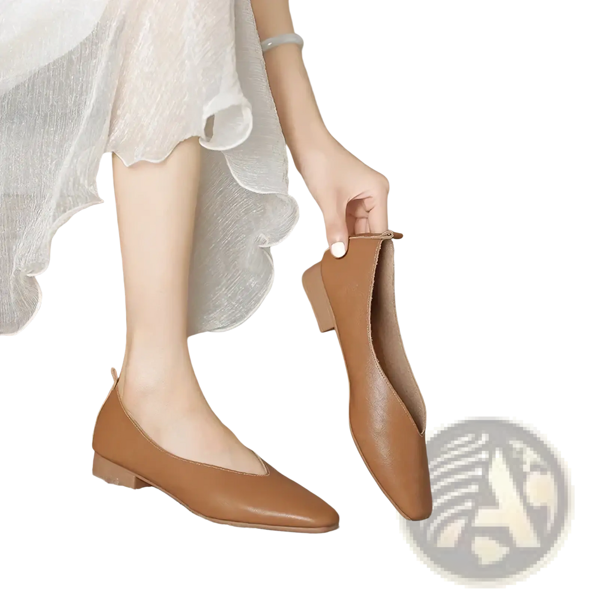 Tan leather flat shoes for women with pointed toe slip on design and low heel for casual wear