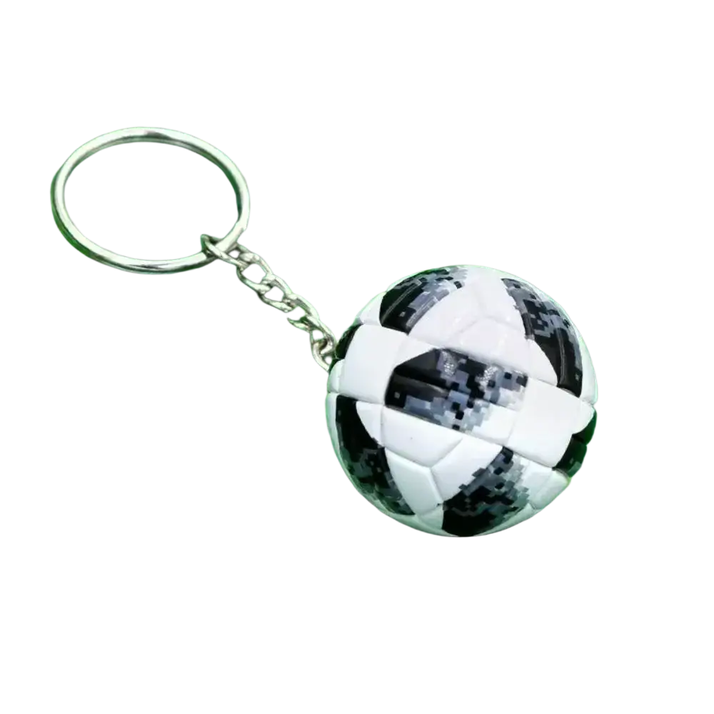 Leather football keychain with black and white pixelated soccer ball design and silver metal ring and chain sports souvenir pendant