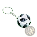 Leather football keychain with black and white pixelated soccer ball design and silver metal ring and chain sports souvenir pendant