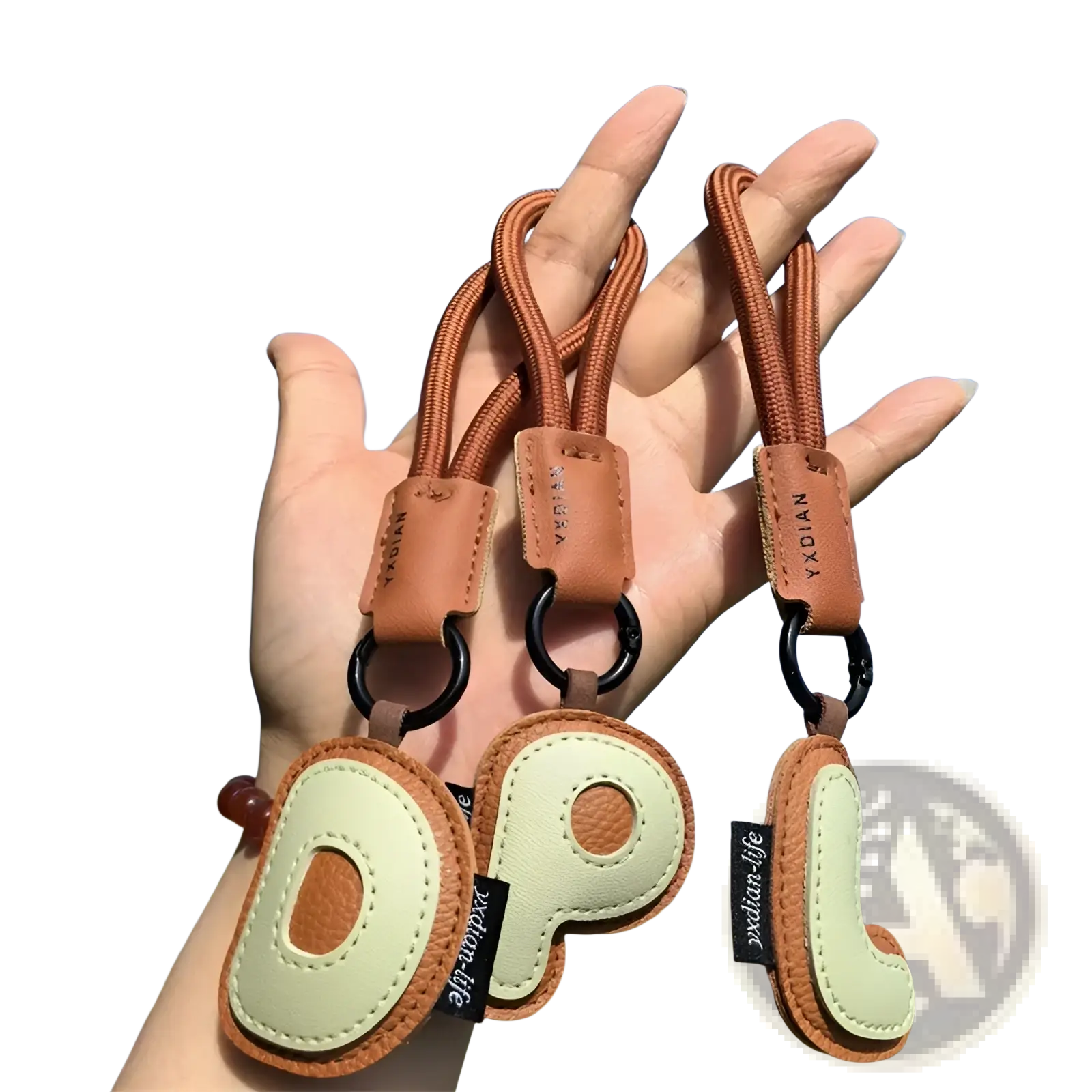 Brown and cream leather initial keychain letter wristband charm with braided cord straps for everyday use